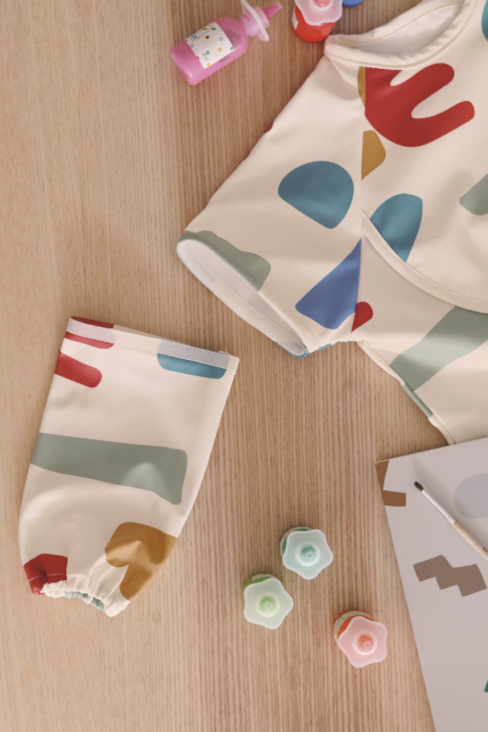 babymarkt Lätzchen 2-in1 mit abnehmbaren Ärmeln Online
